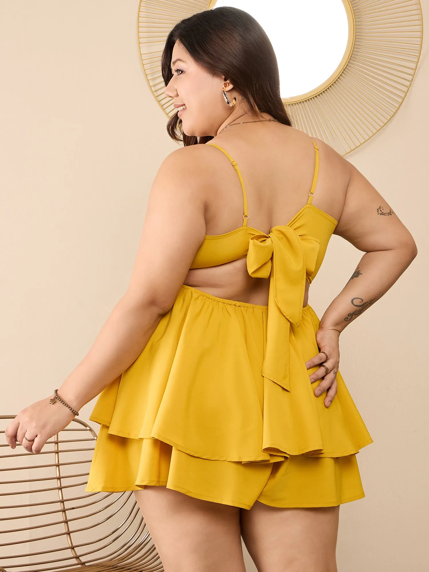 Berrylush Curve Women Solid Yellow Square Neck Sleeveless Back Cutout Tie-Up Layered Mini Jumpsuit