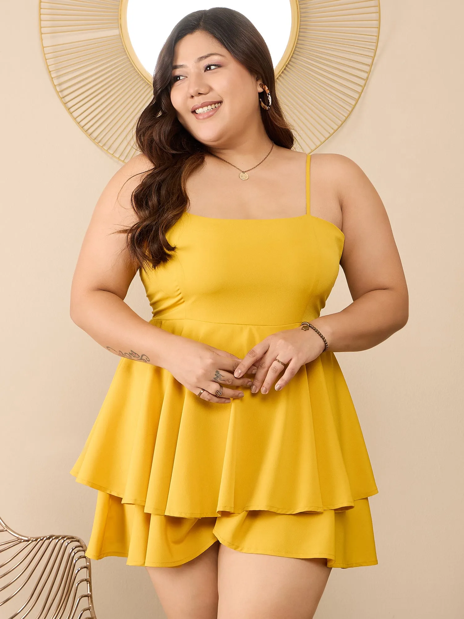 Berrylush Curve Women Solid Yellow Square Neck Sleeveless Back Cutout Tie-Up Layered Mini Jumpsuit
