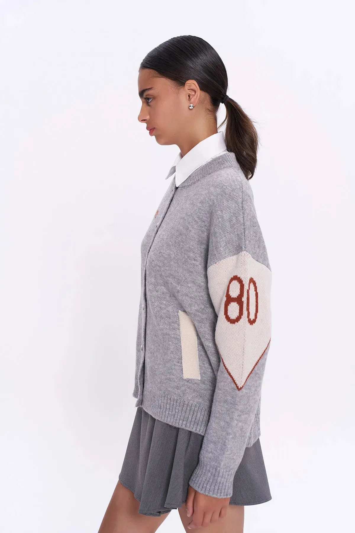 Gray Knitted Cardigan with Colorful Patterned Back Buttons